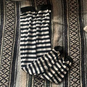 thigh high stripped socks, don’t ride down and fits most